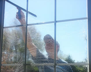Window Cleaning with squeegee